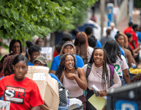 A group of new Howard students and their families on move-in day.